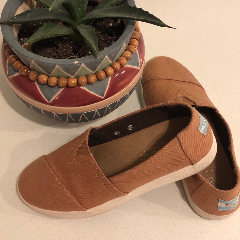 TOMS brand slip on shoes